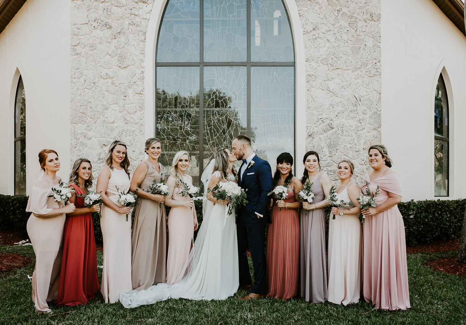 bridesmaids with pastel dresses 