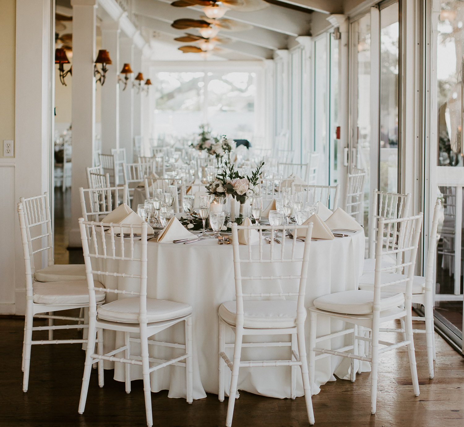 dreamy table at venue with white linens 