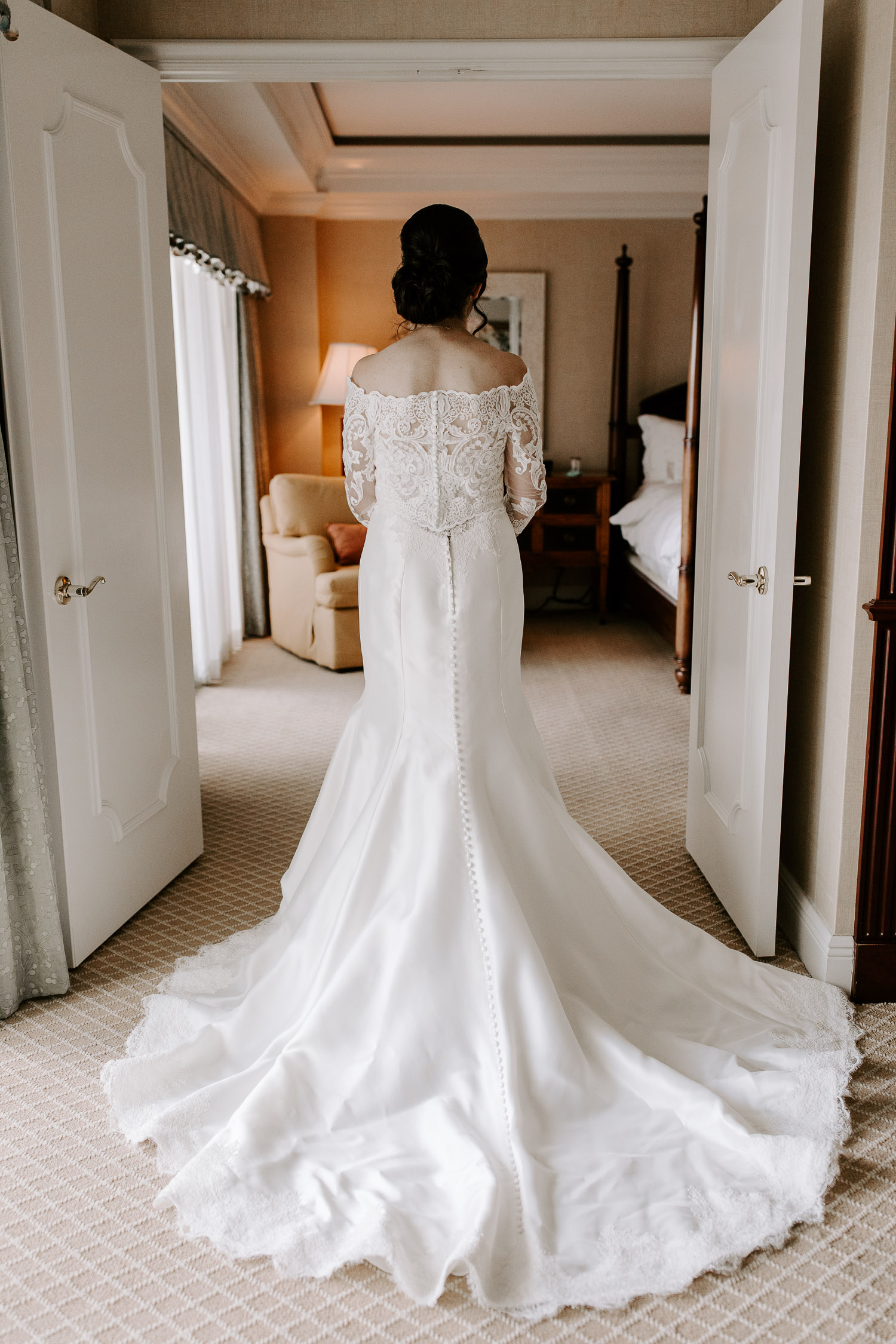 bride dressed with white wedding gown 