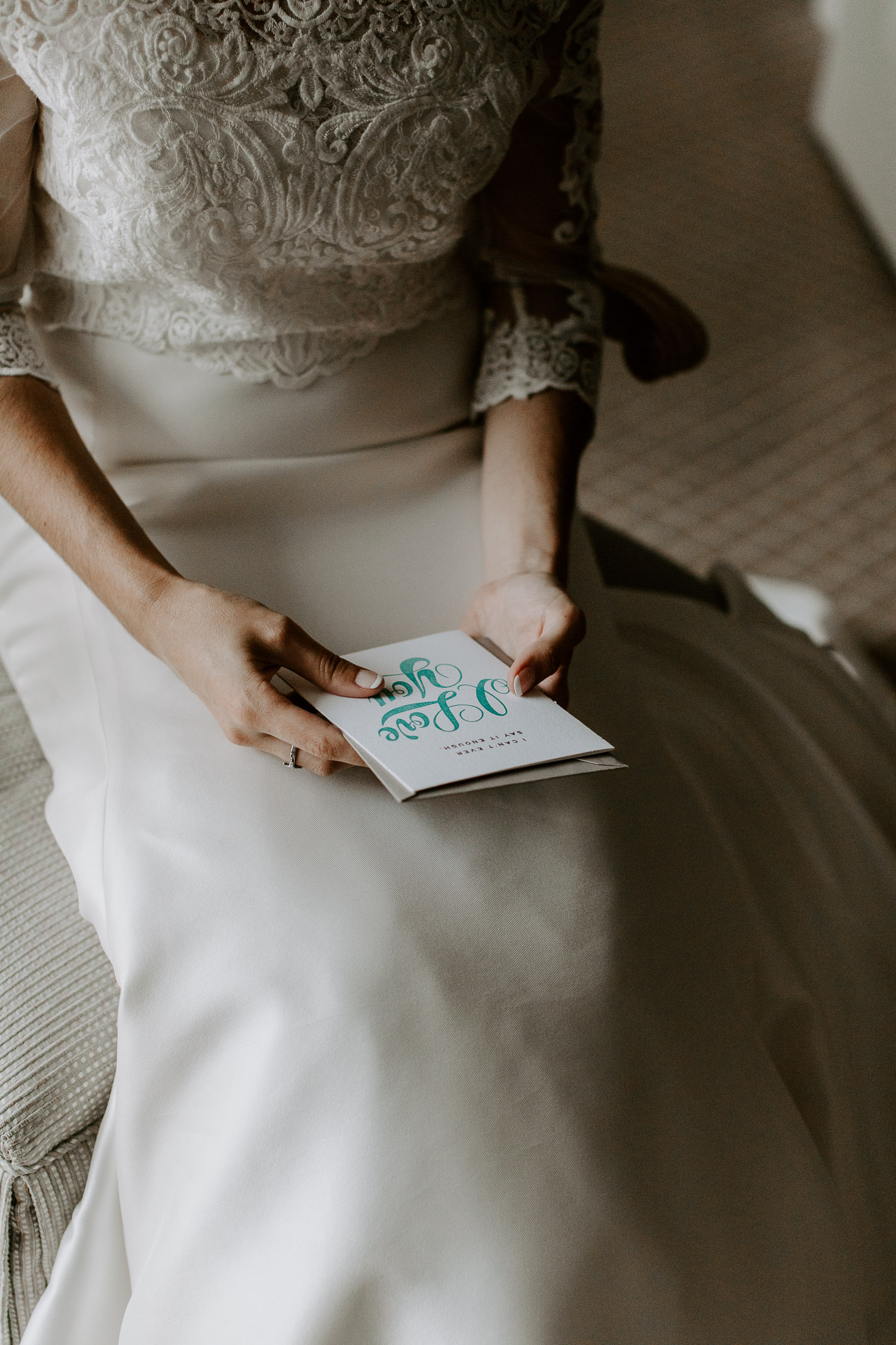 bride reading card from groom