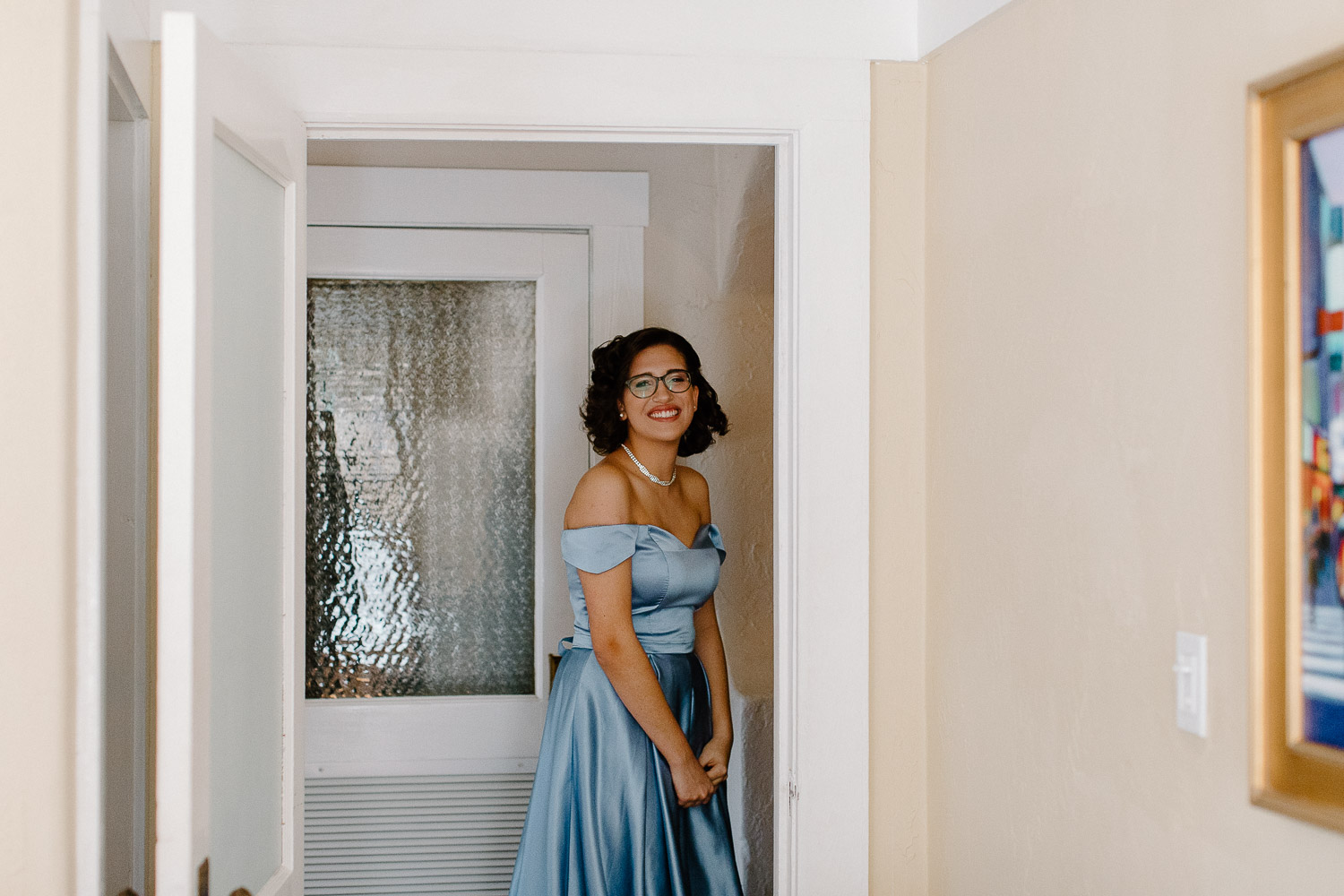 bridesmaid wearing a blue dress 