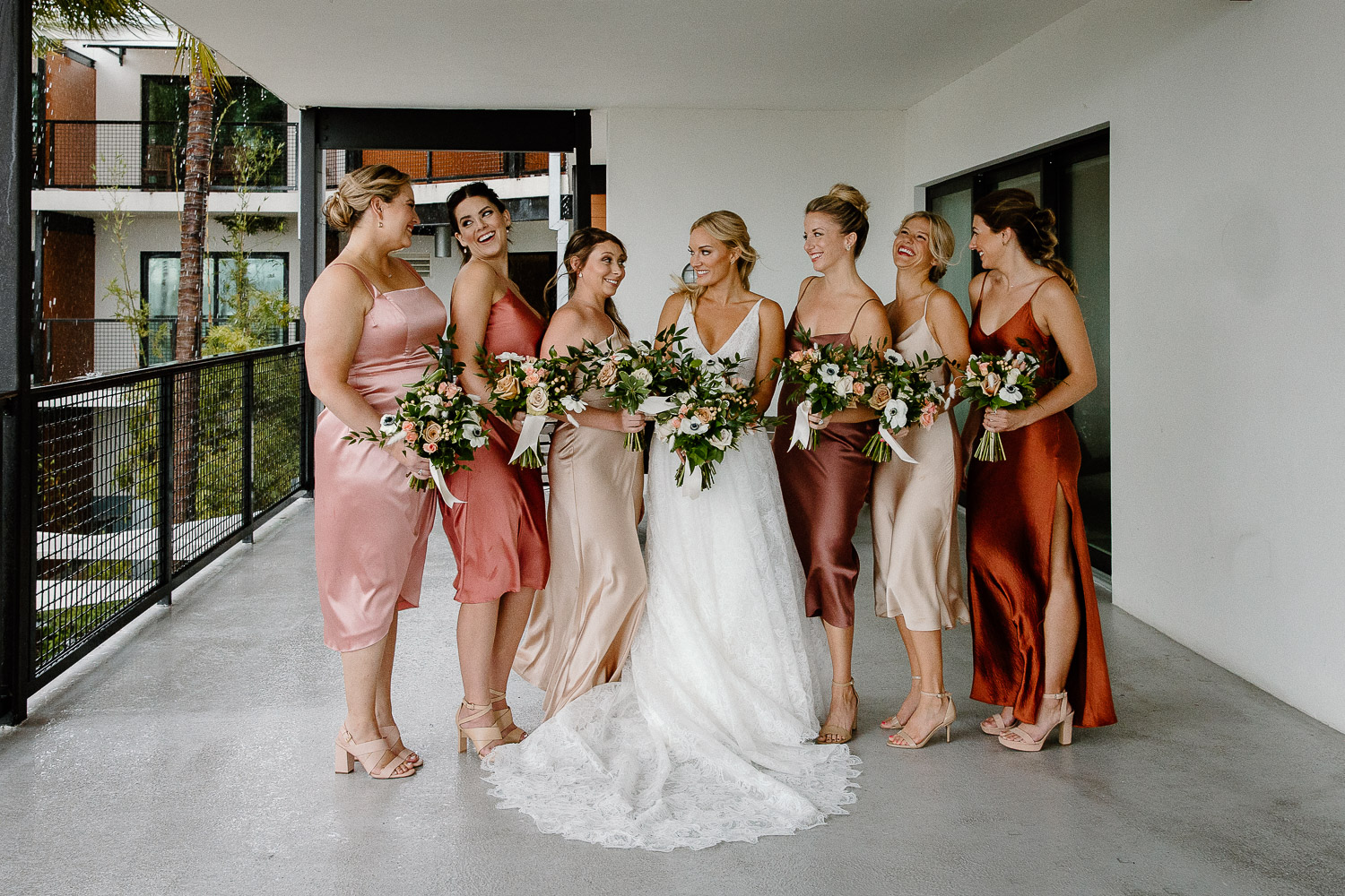 bridesmaids dressed with their bouquets 