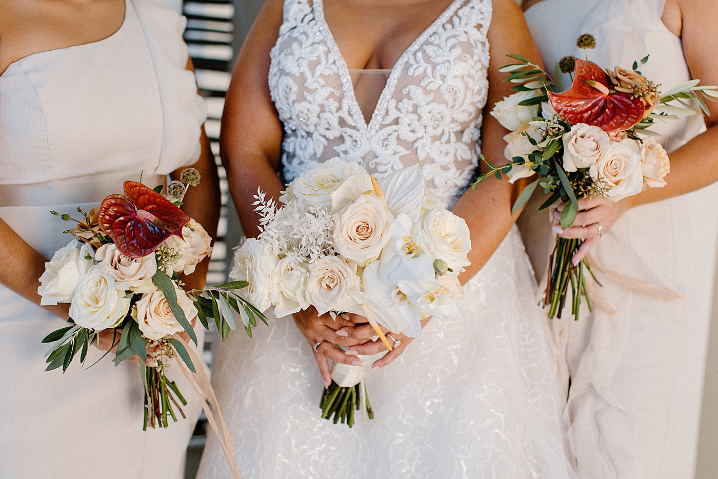 Closeup of Bride and Bridesmaids bouquets Modern Elegant Wedding at The W South Beach captured by South Florida Wedding Photographer Erika Tuesta Photography