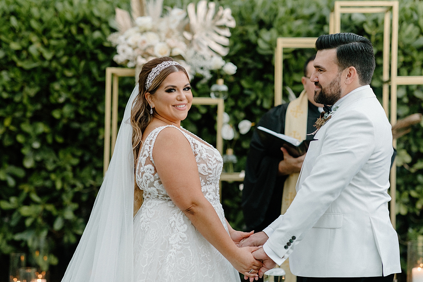 Groom looking at Bride at Ceremony alter Modern Elegant Wedding at The W South Beach captured by South Florida Wedding Photographer Erika Tuesta Photography