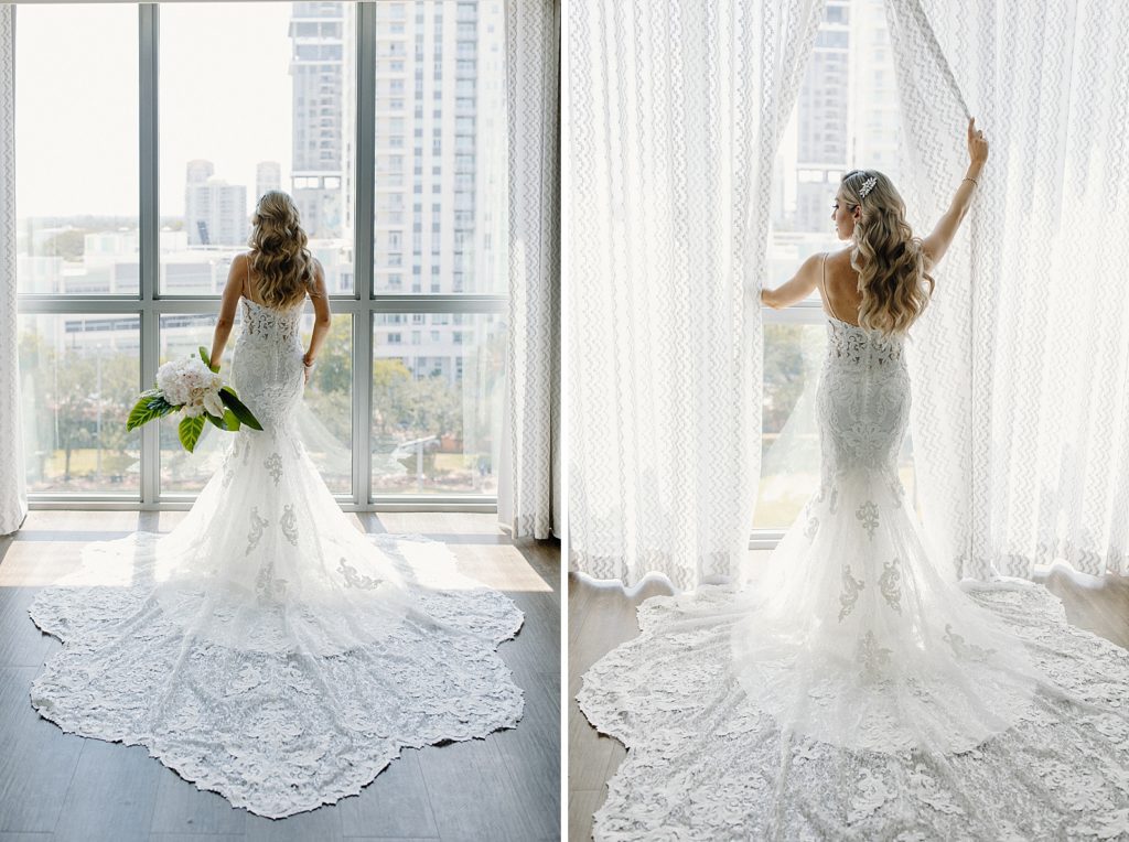 Bride looking out the window with train extended out on floor
