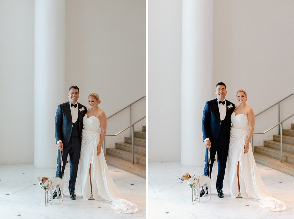 Portrait of Bride and Groom with their pet dog in hotel lobby
