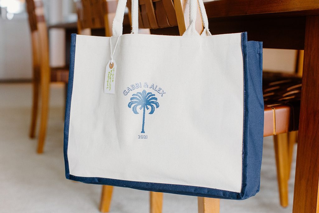 Detail shot of Bride and Groom personalized bag with palm tree