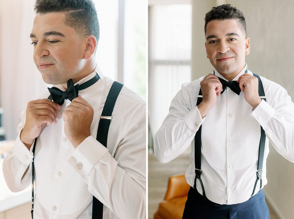 Groom getting ready putting on bow tie in hotel room