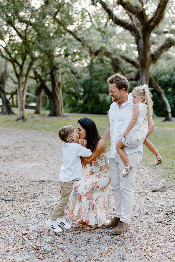 family smiling at matheson hammock park 