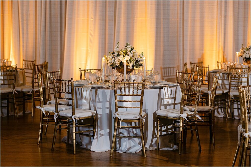 Gold Chiavari chairs at luxury Comber Hall Miami wedding